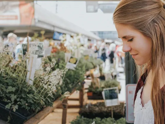 Young women browsing at farmer's market