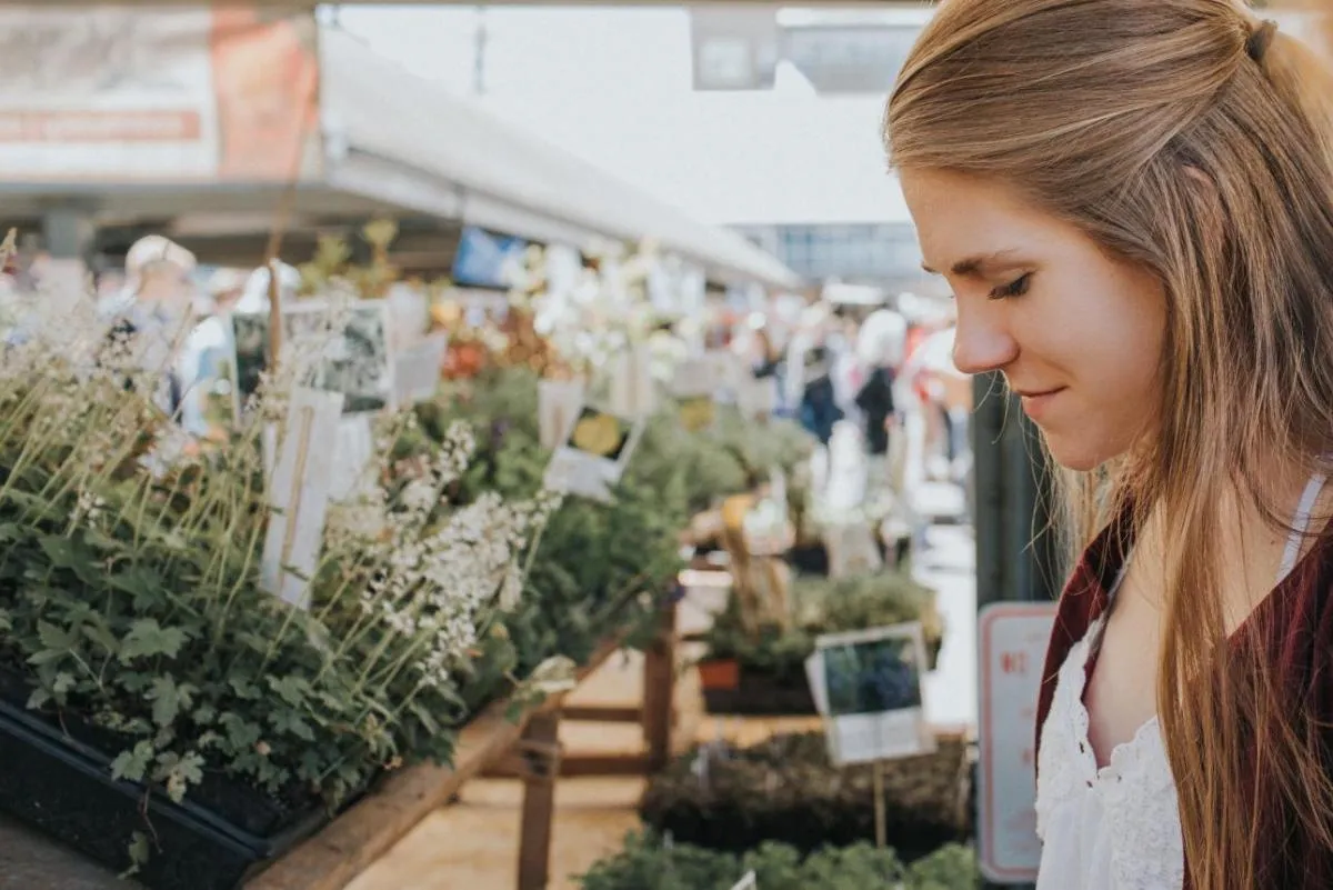 Young women browsing at farmer's market